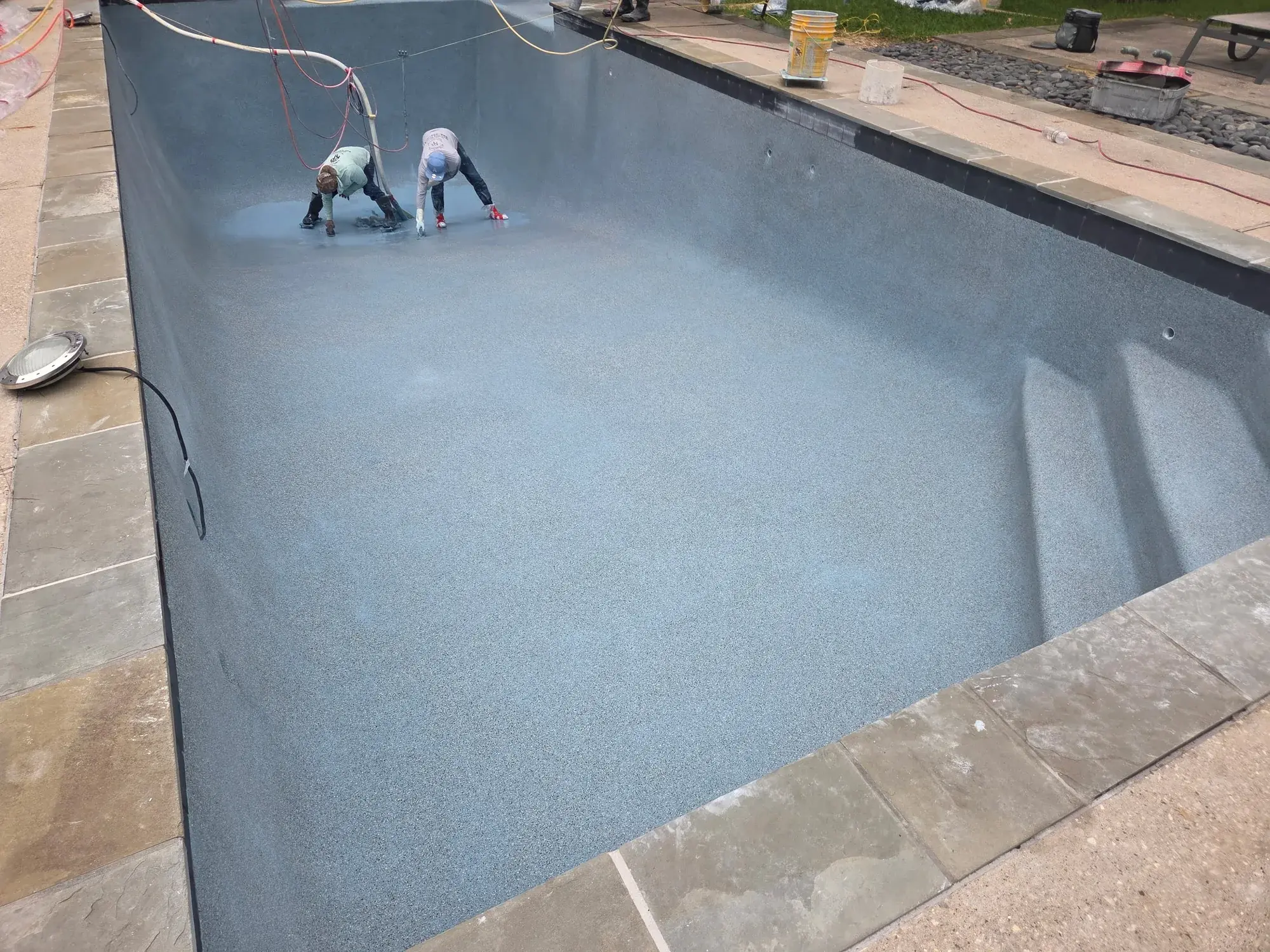 Pool plaster resurfacing in progress during a renovation by Sam Houston Pools and Outdoors